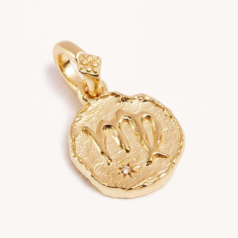 Kaulakoru astrologisella riipuksella, horoskooppimerkki