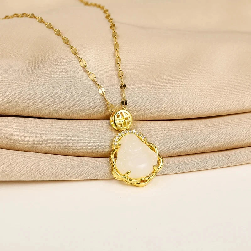 Kaulakoru valkoisella Buddhan riipuksella