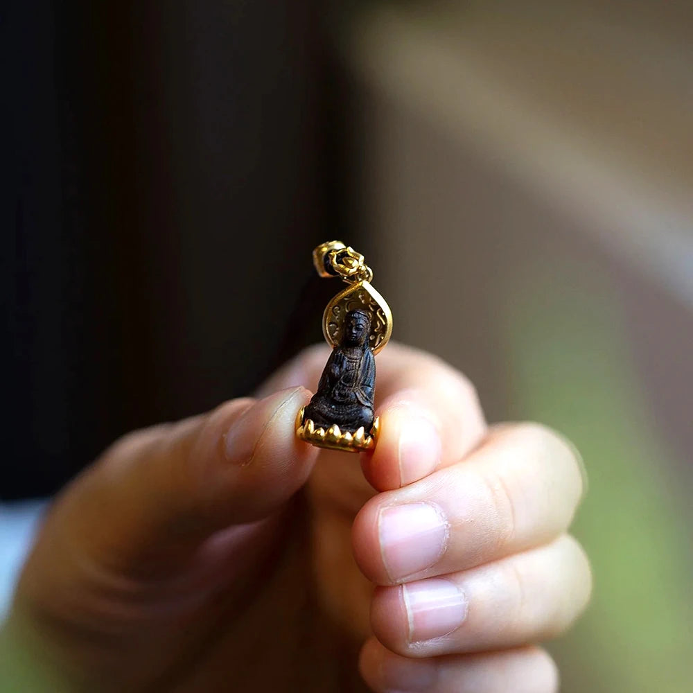 Kaulakoru Tiibetin Buddhan riipuksella