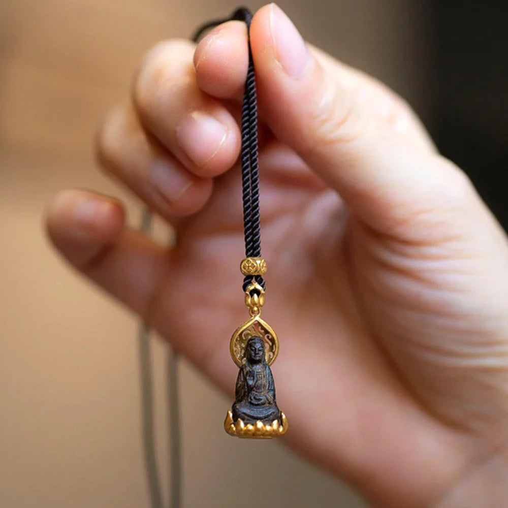 Kaulakoru Tiibetin Buddhan riipuksella