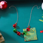 Kaulakoru joulupalloriipuksella