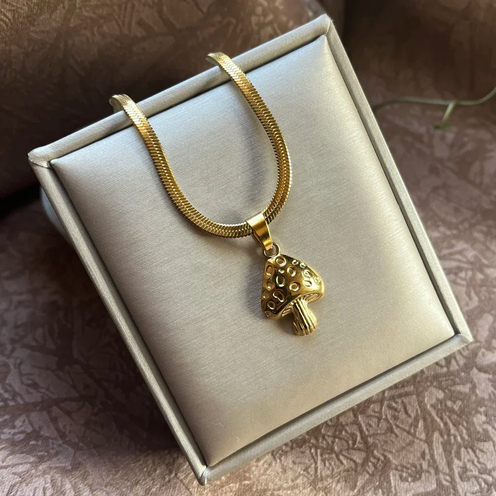 Kaulakoru kultainen sieniriipus