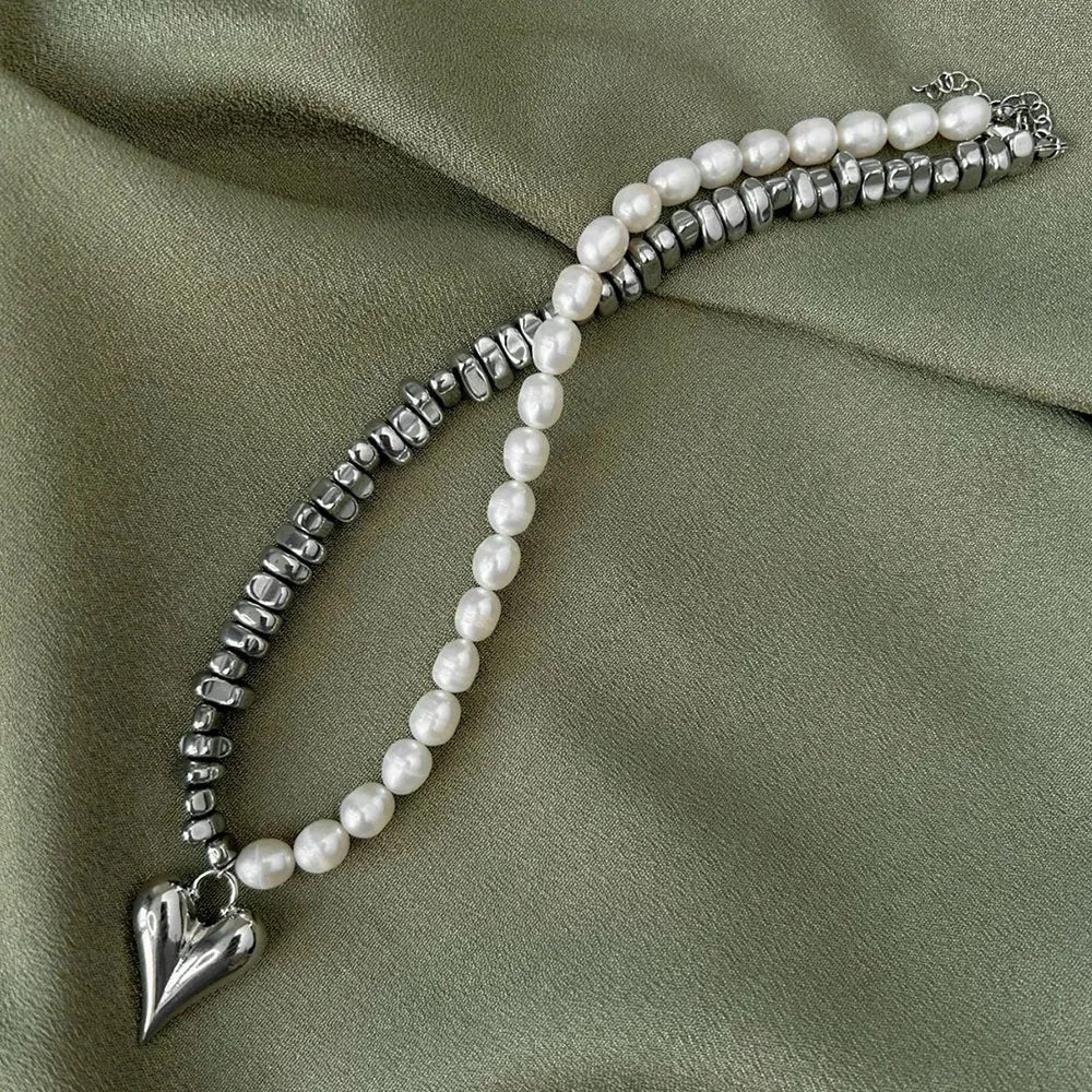 Kaulakoru sydänriipuksella C