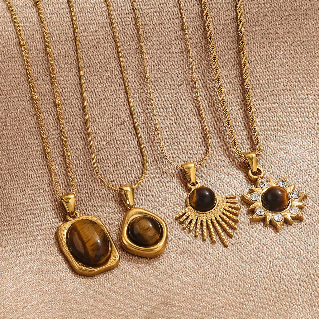 Kaulakoru Tiikerinsilmä-suojariipuksella naisille B