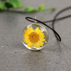 Kaulakoru puhalletulla lasiriipuksella, Elämänpuu