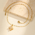 Kaulakoru pyörivällä zirkonikoristeisella kukkariipuksella, stressiä lievittävä