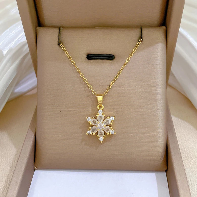 Kaulakoru kristallilumihiutale-riipuksella