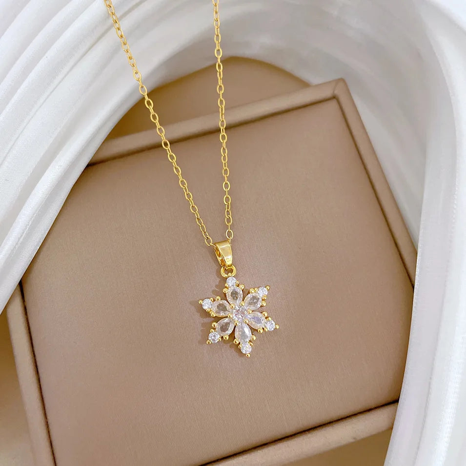 Kaulakoru kristallilumihiutale-riipuksella