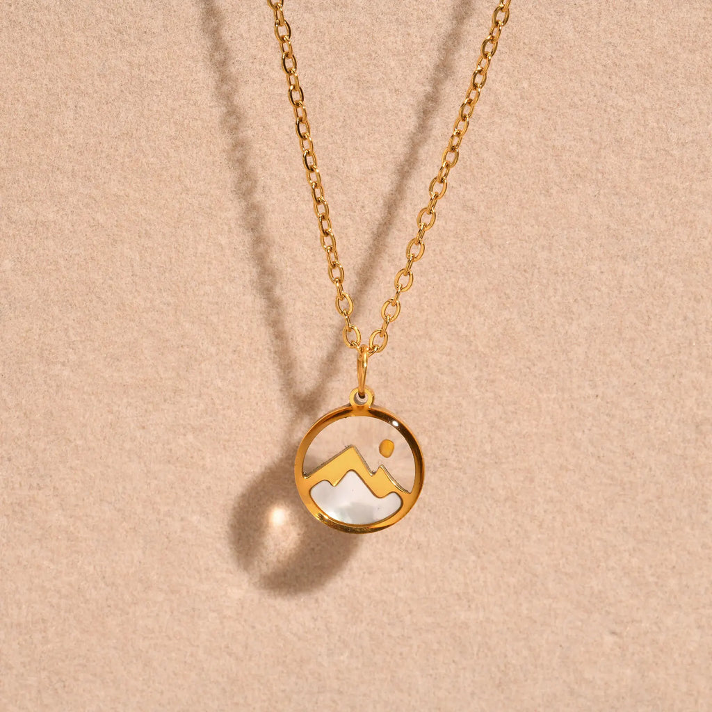 Kaulakoru, jossa on vuori- ja kuu-riipus