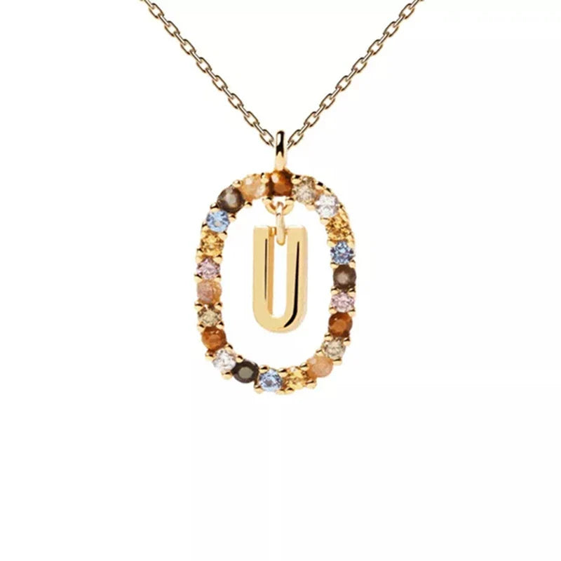 Kaulakoru soikealla alkukirjainriipuksella u