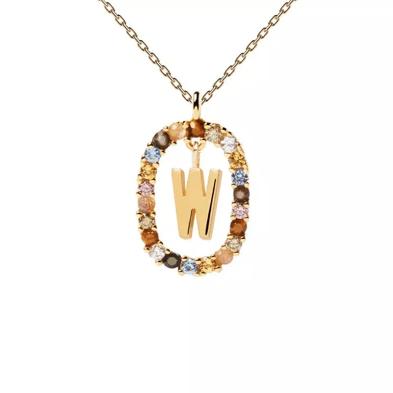 Kaulakoru soikealla alkukirjainriipuksella w