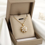 Kaulakoru pyörivällä kukka-anti-stress-riipuksella naisille