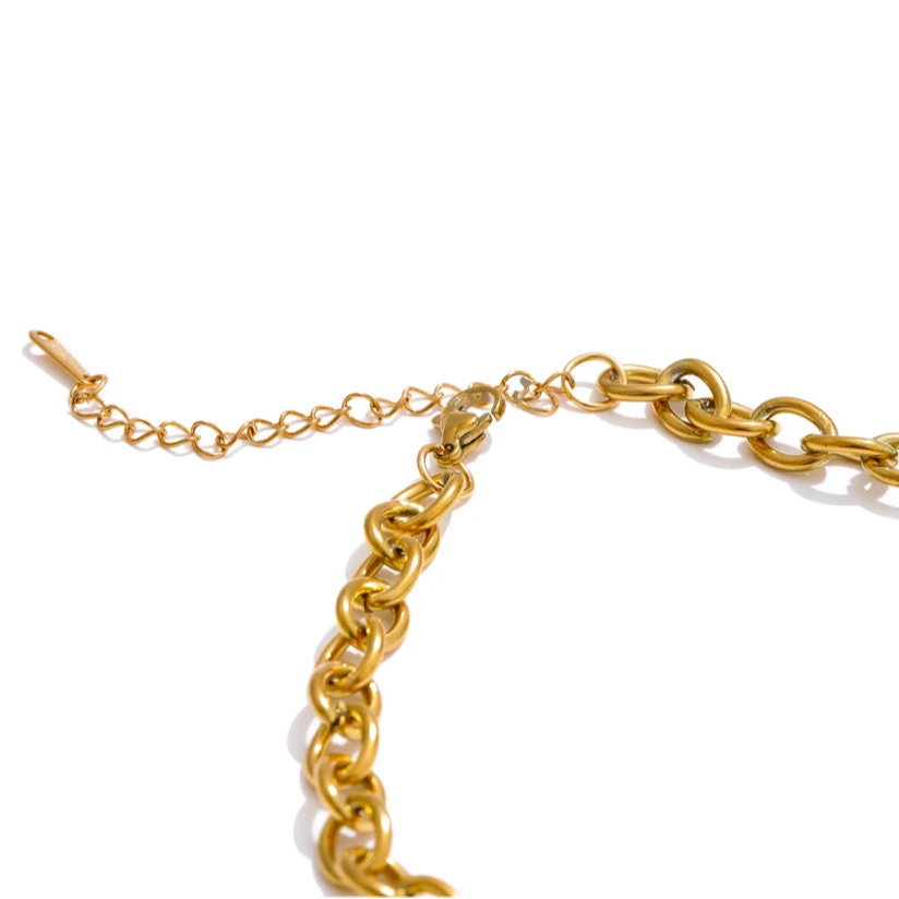 Kaulakoru, jossa aurinko- ja kuu-riipus naisille