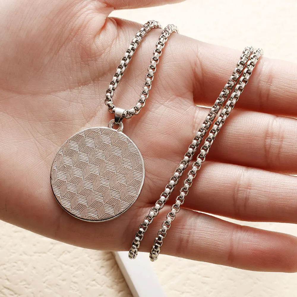 Kaulakoru mustavalkoisella Yin Yang -riipuksella