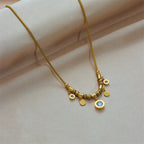 Kaulakoru zirkon-riipuksilla