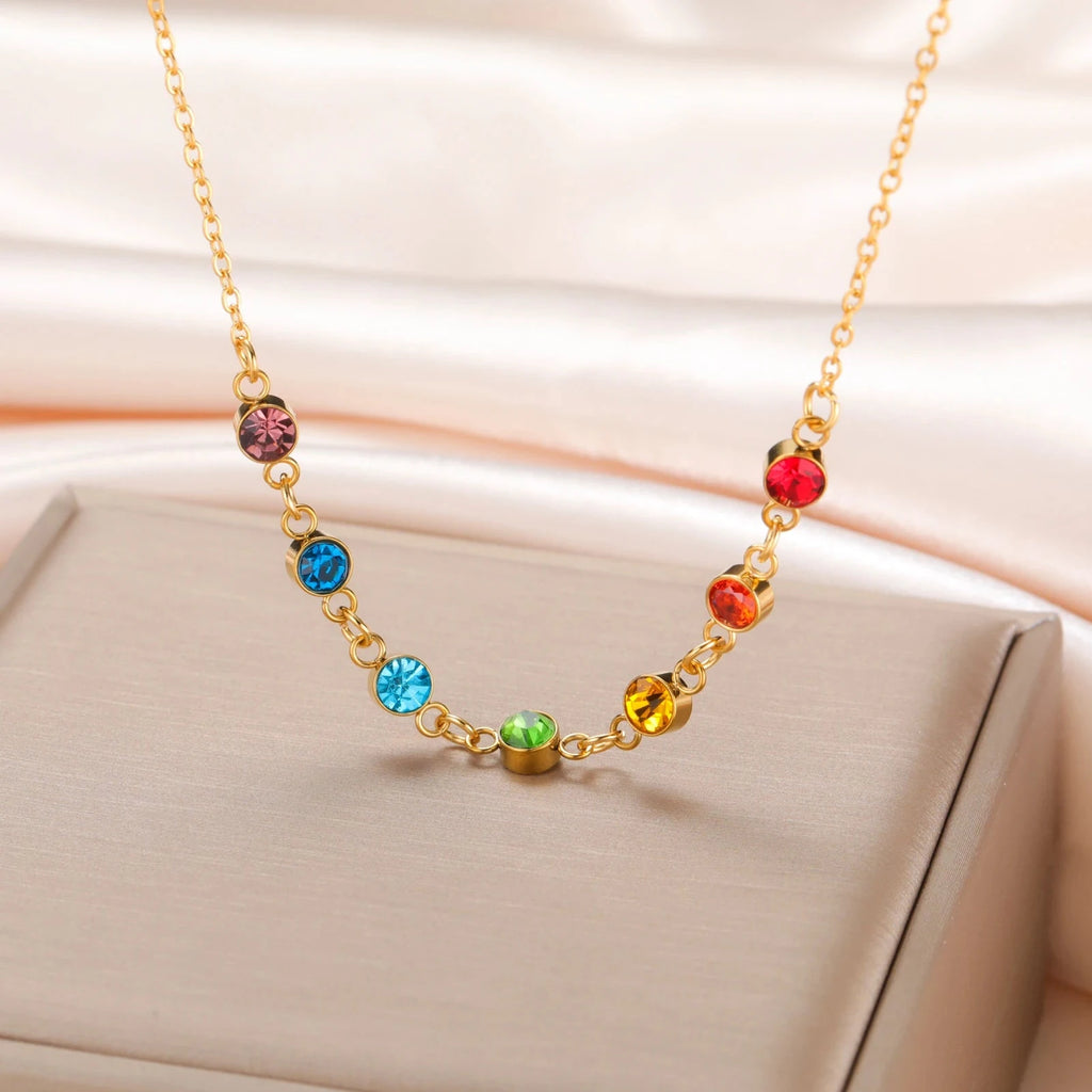 Suojaava kaulakoru 7 chakran kiviriipuksella naisille kulta