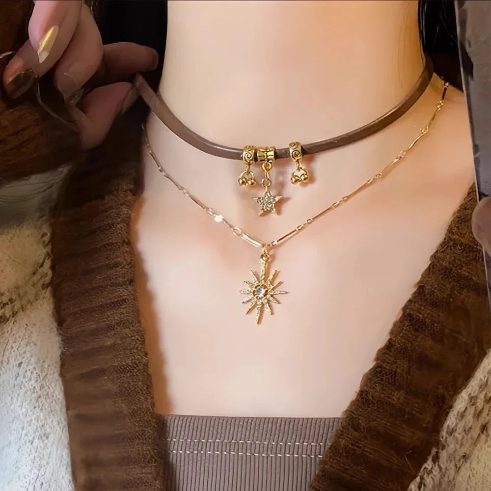 Kaksoisriipus, jossa aurinko