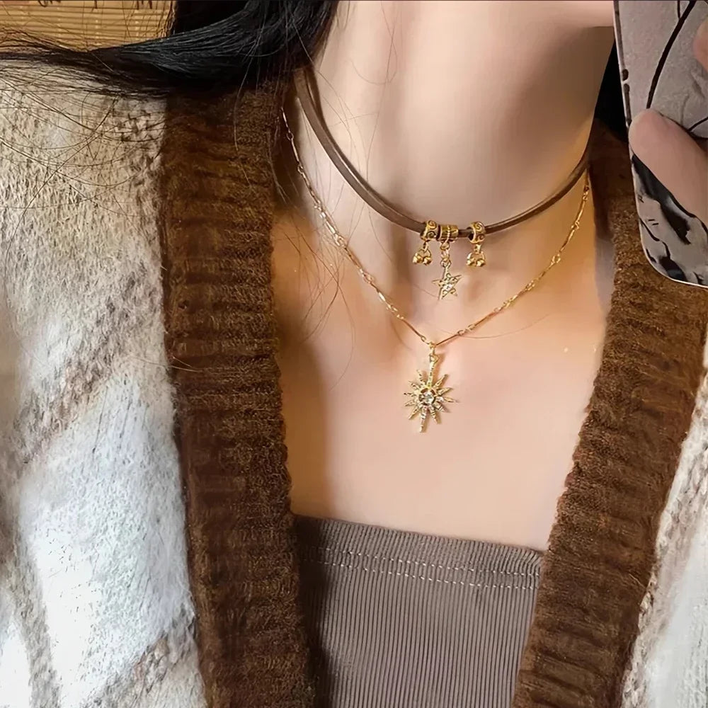 Kaksoisriipus, jossa aurinko