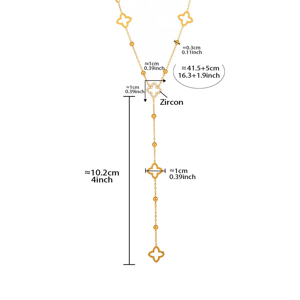 Pitkä kaulakoru, jossa nelilehtinen apila ja zirkoni 