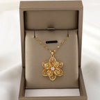 Kaulakoru-riipus, jossa on kaunis pyörivä kukka, stressiä lievittävä