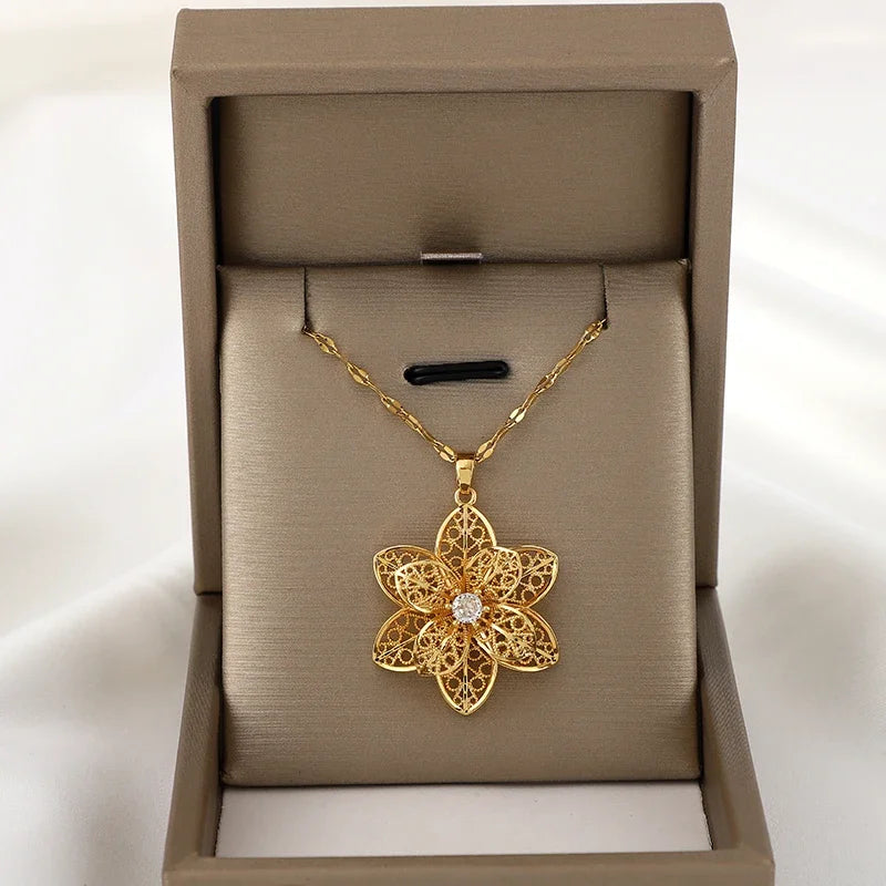 Kaulakoru-riipus, jossa on kaunis pyörivä kukka, stressiä lievittävä