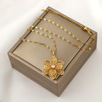 Kaulakoru-riipus, jossa on kaunis pyörivä kukka, stressiä lievittävä