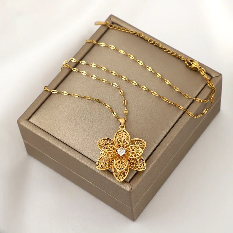 Kaulakoru-riipus, jossa on kaunis pyörivä kukka, stressiä lievittävä