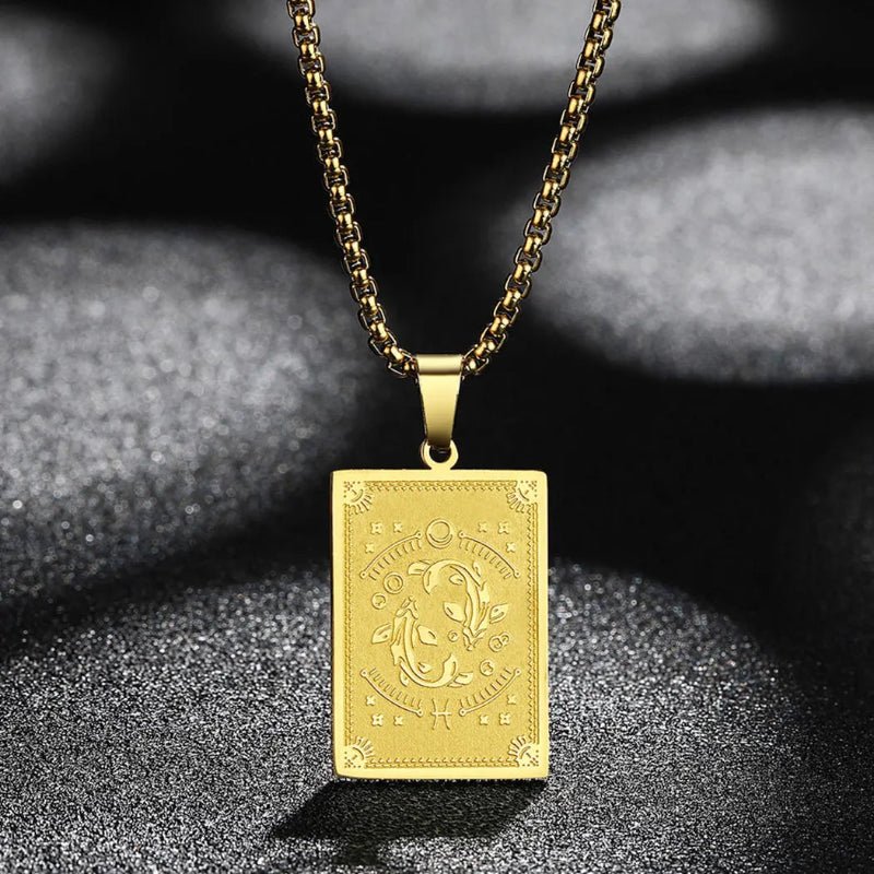 Kaulakoru riipuksella ja horoskooppimerkki