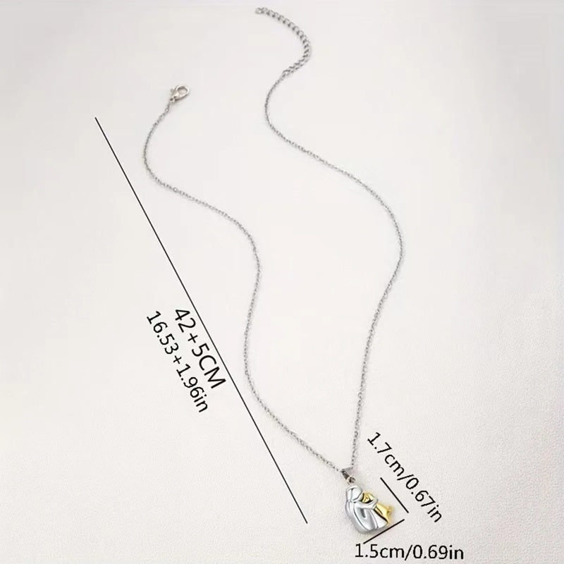 Halauskoiran ja isännän riipuskaulakoru 