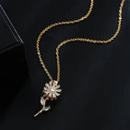 Kultainen pyörivä auringonkukkariipus kaulakorussa, stressiä lievittävä