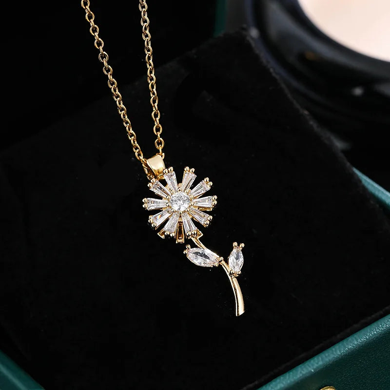 Kultainen pyörivä auringonkukkariipus kaulakorussa, stressiä lievittävä