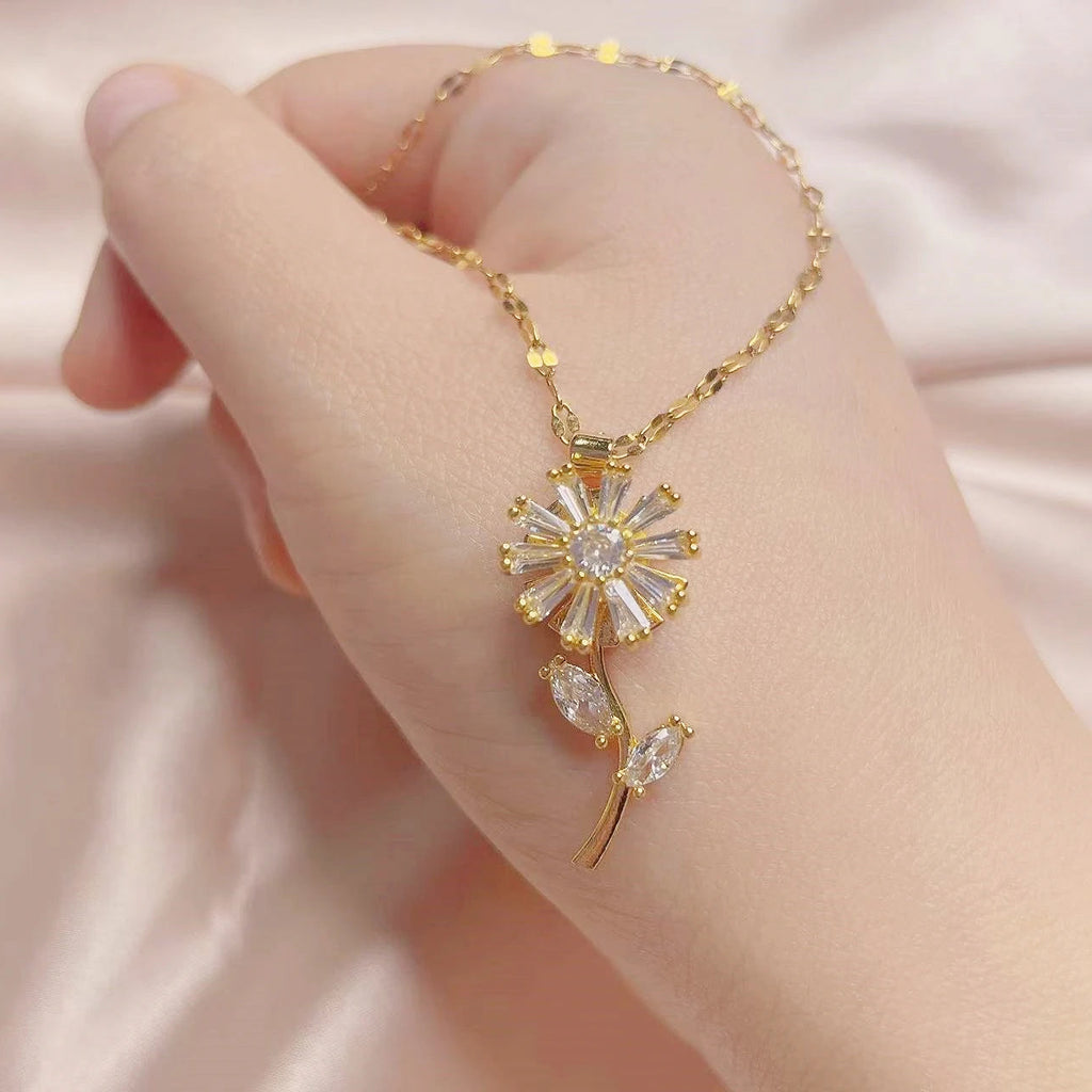 Kultainen pyörivä auringonkukkariipus kaulakorussa, stressiä lievittävä