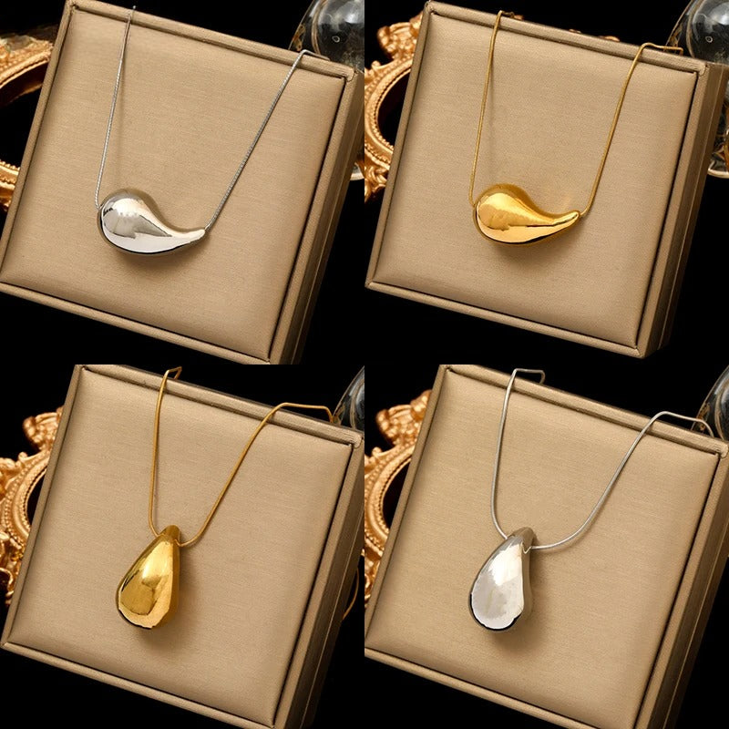 Kultainen tai hopeinen vesipisaran riipuskaulakoru