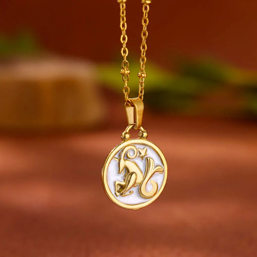 Kaulakoru riipuksella kulta ja valkoinen horoskooppimerkki 12 tähtikuviota kauris