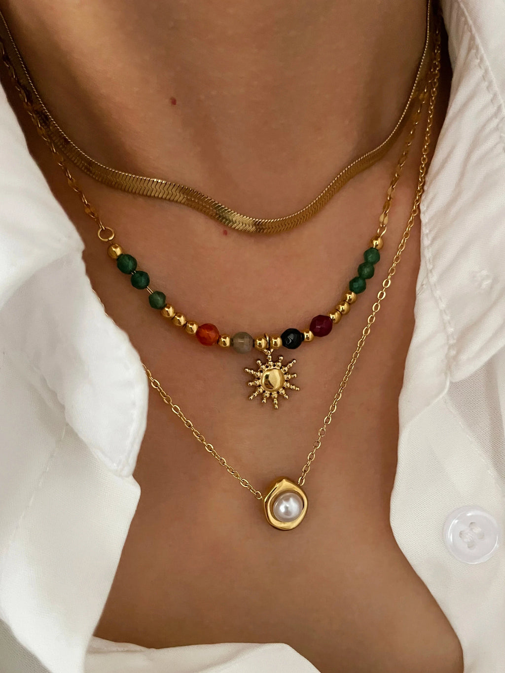 Kaulakorut Aurinkoriipus ja Helmet a