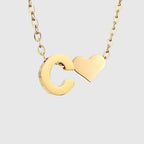 Naisten kaulakoru sydänriipuksella ja nimikirjaimella - kirjain 