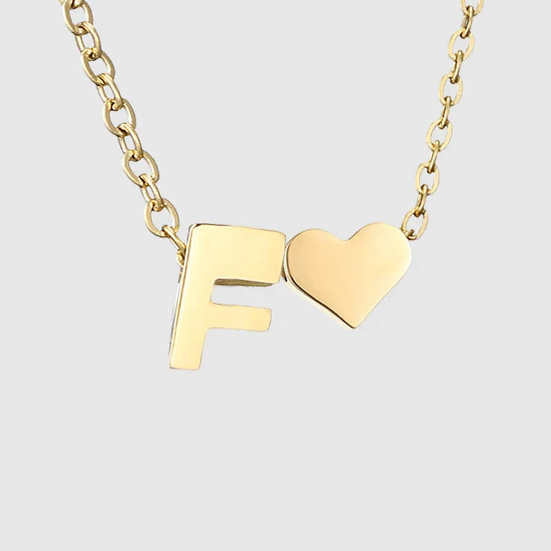 Naisten kaulakoru sydänriipuksella ja nimikirjaimella - kirjain 