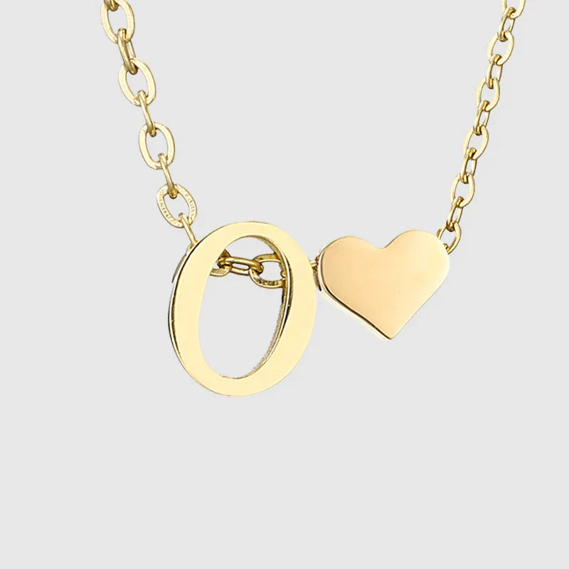 Naisten kaulakoru sydänriipuksella ja nimikirjaimella - kirjain 