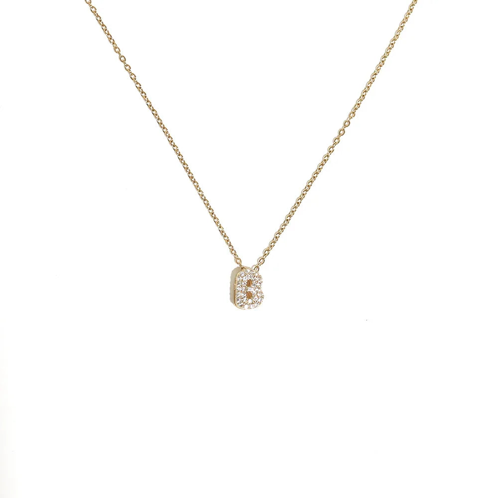 Naisen choker-kaulakoru minimalistisella b-kirjaimen riipuksella