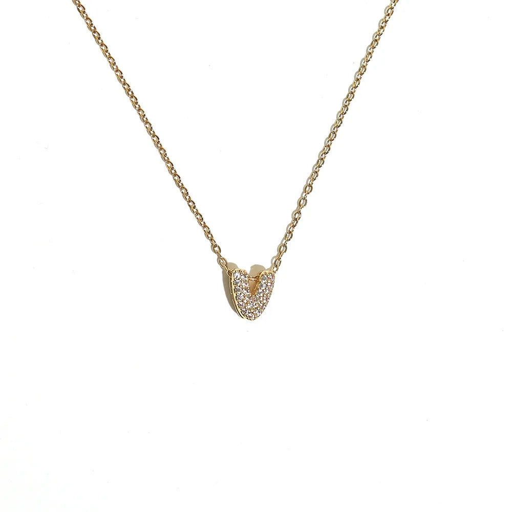Naisen choker-kaulakoru minimalistisella v-kirjaimen riipuksella