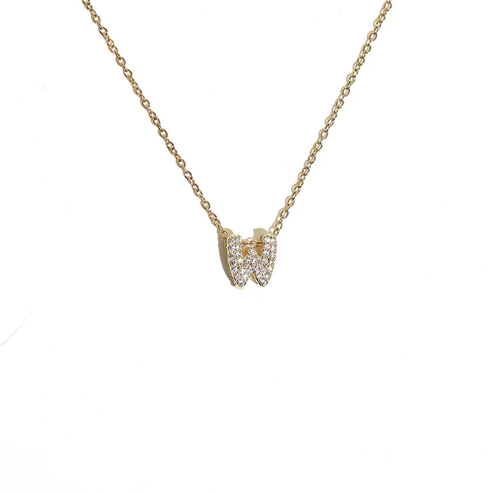 Naisen choker-kaulakoru minimalistisella w-kirjaimen riipuksella