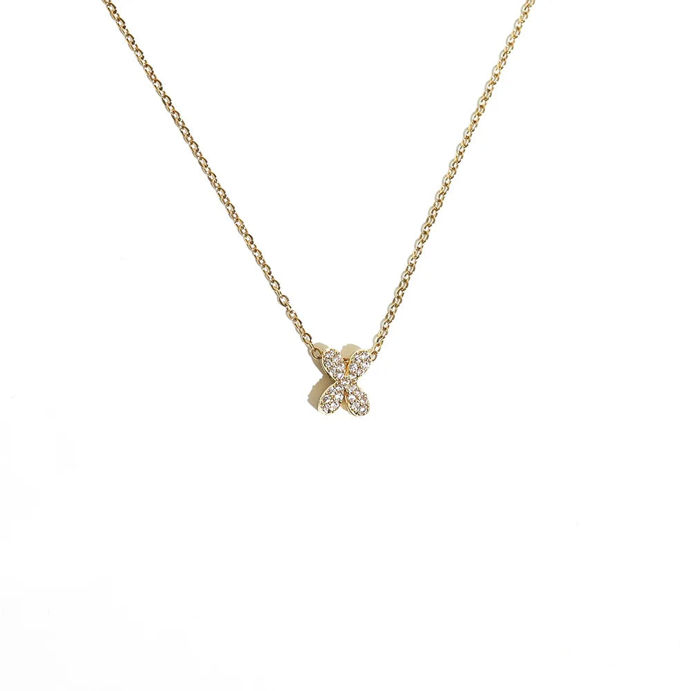 Naisen choker-kaulakoru minimalistisella x-kirjaimen riipuksella