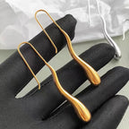 Tyylikkäät roikkuvat korvakorut, hieno vesipisara kulta