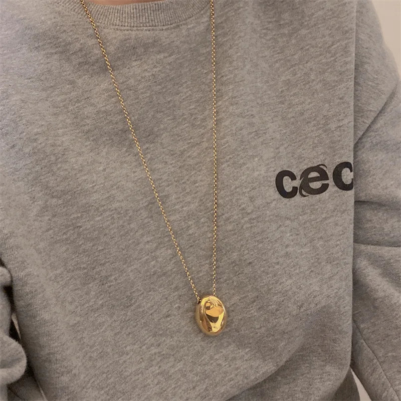 Pitkä kaulakoru suuri vesipisaran riipus kulta