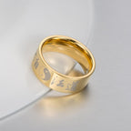 Yin Yang -sormus kultaisena