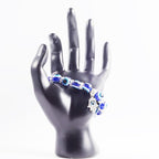 Arabialainen rannekoru Fatman kädellä