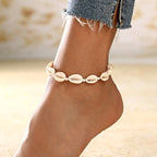 Naisten nilkkakoru, jossa simpukka