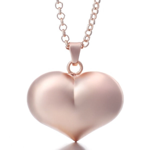 Raskaana olevan naisen kaulakoru Bola de Grossesse värikkäällä riipuksella 