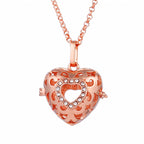 Raskaana olevan naisen kaulakoru Bola de Grossesse ontolla riipuksella 