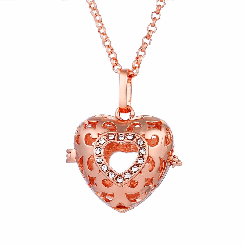 Raskaana olevan naisen kaulakoru Bola de Grossesse ontolla riipuksella 